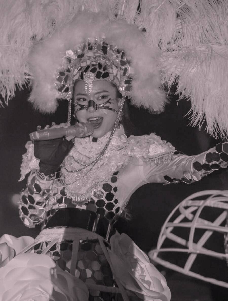 Tincy Tan performing in an elaborate mirrored costume